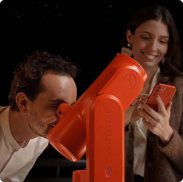 A Couple Using the Unistellar Odyssey Pro Red Edition Smart Telescope - Compact, Lightweight and User-Friendly Telescope