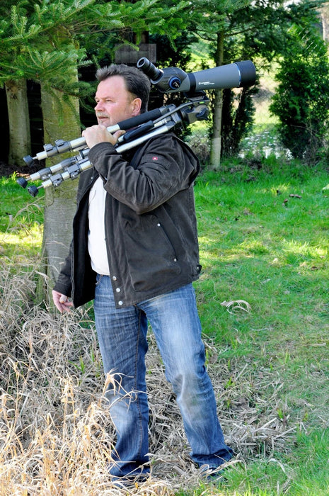 A Man Carrying the Bresser Dachstein 20-60x80mm ED 45° Angled Spotting Scope
