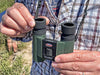 A Man Holding the Kowa SV II 10x25mm Binocular