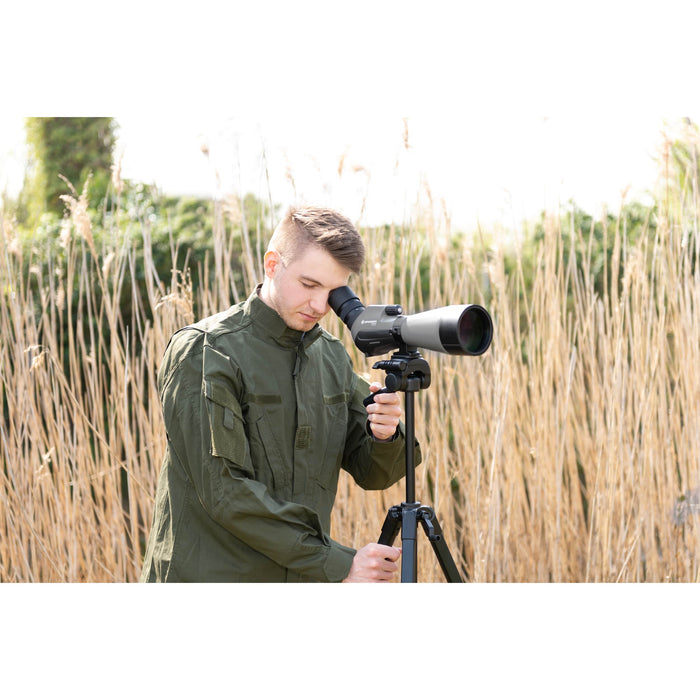 A Man Using Bresser Condor 20-60x85mm Angled Spotting Scope Outdoors