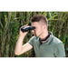 A Man Using Vixen ATERA H12x30mm Image Stabilized Binoculars Outdoors