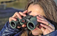 A Woman Using Kowa YF II 6x30mm Porro Prism Binocular Outdoors