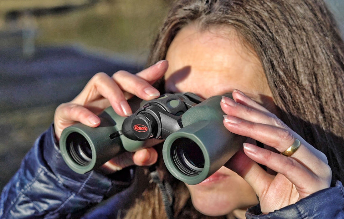 A Woman Using Kowa YF II 8x30mm Porro Prism Binocular Outdoors