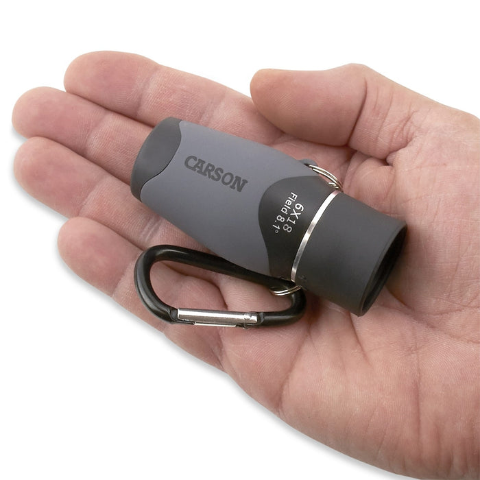 Carson MiniMight™ 6x18mm Monocular with Carabiner Clip on Palm of Hand