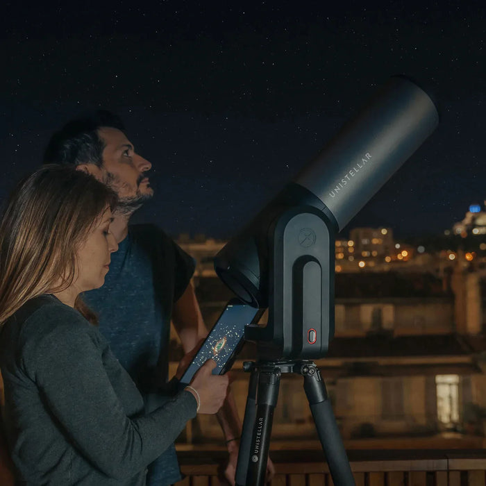 Couple Using the Open Box Unistellar eQuinox 2 and Backpack Smart Digital Reflector Telescope for Astrophotography